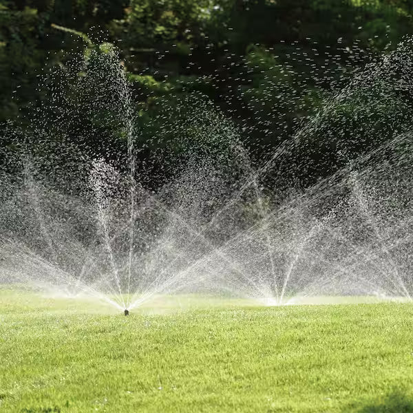 Hunter sprinklers watering a lawn